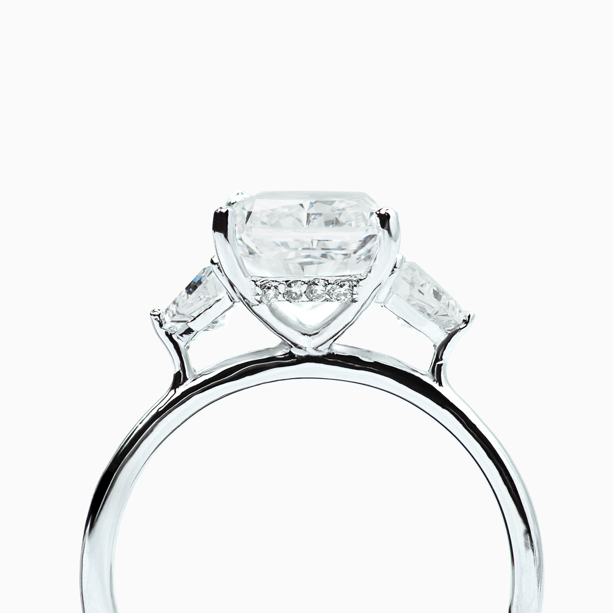 3 Stone Hidden Halo Radiant and Shield Shaped Diamond Engage